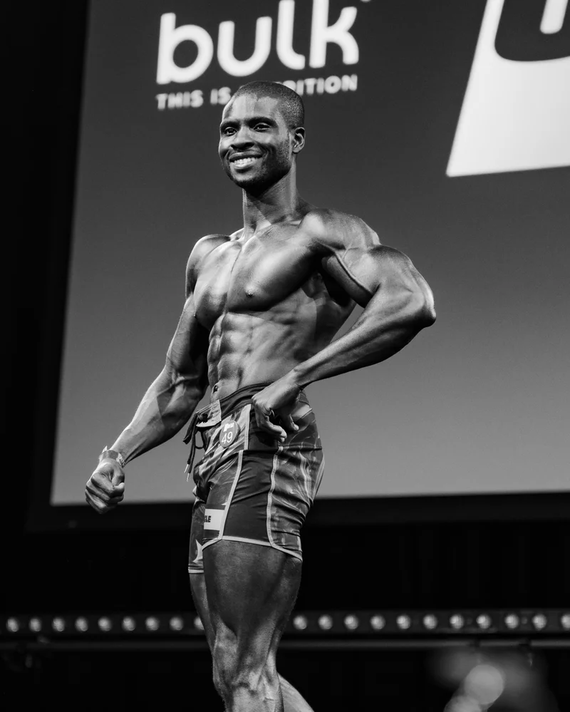 Femi posing on stage at UKDFBA